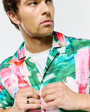 Mens Nate Tencel Shirt: Vibrant multi-color abstract brushstroke camp collar shirt with a relaxed fit, featuring a small embroidered Psycho Bunny skull logo on the left chest.
