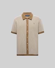 Mens Maxton Waffle Shirt, a classic fit beige and brown micro-check waffle knit shirt with a solid brown ribbed collar, full button placket, cuffs, hem, and an embroidered Psycho Bunny skull logo on the left chest.