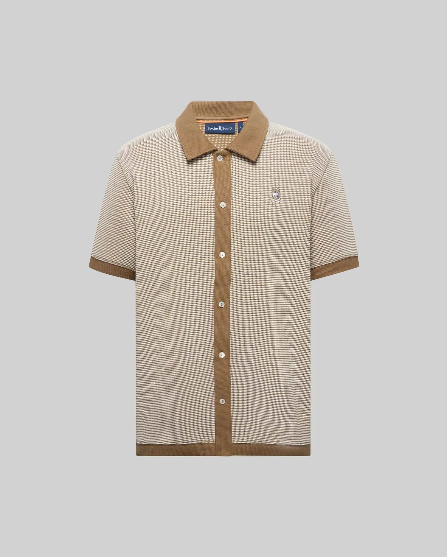 Mens Maxton Waffle Shirt, a classic fit beige and brown micro-check waffle knit shirt with a solid brown ribbed collar, full button placket, cuffs, hem, and an embroidered Psycho Bunny skull logo on the left chest.