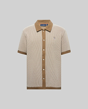 Mens Maxton Waffle Shirt, a classic fit beige and brown micro-check waffle knit shirt with a solid brown ribbed collar, full button placket, cuffs, hem, and an embroidered Psycho Bunny skull logo on the left chest.
