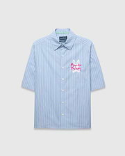 Mens Duncan Stripe Shirt, light blue woven short-sleeve button-up with thin dark blue vertical stripes and a large, classic fit, vibrant pink and white embroidered Psycho Bunny logo on the chest.