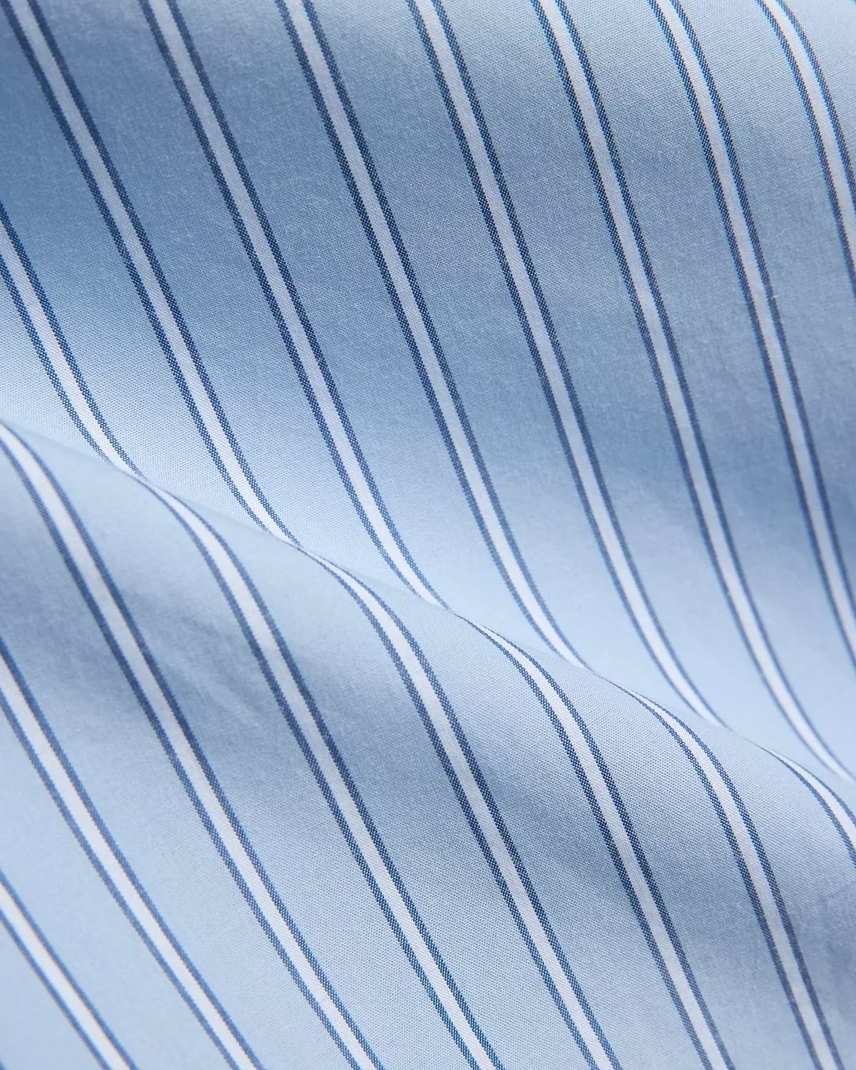 Mens Duncan Stripe Shirt, a light blue fine woven fabric with crisp vertical stripes in white and thin dark blue, showcasing a refined classic pattern.