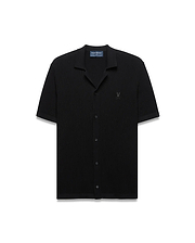 Black Mens Yann Knit Shirt with a classic fit, featuring a ribbed knit texture, full button-front, spread collar, short sleeves, and a small embroidered Psycho Bunny skull logo on the left chest. (5)
