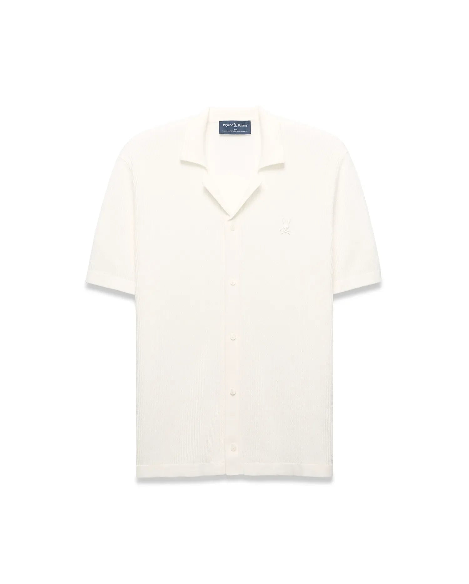Mens Yann Knit Shirt, cream ribbed knit, short-sleeve, full button-front, camp collar, with a small embroidered Psycho Bunny skull logo on the left chest, classic fit. (6)