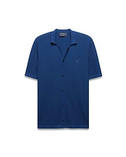 Mens Yann Knit Shirt in deep blue, featuring a ribbed knit texture, open collar, short sleeves, black button placket, and a small embroidered Psycho Bunny skull logo on the left chest. (5)