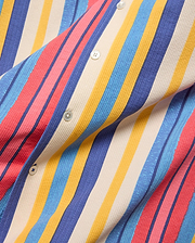 Mens Hubert Knit Shirt, vibrant multi-color vertical stripes in red, pink, blue, yellow, and cream, with a textured knit fabric and white buttons.