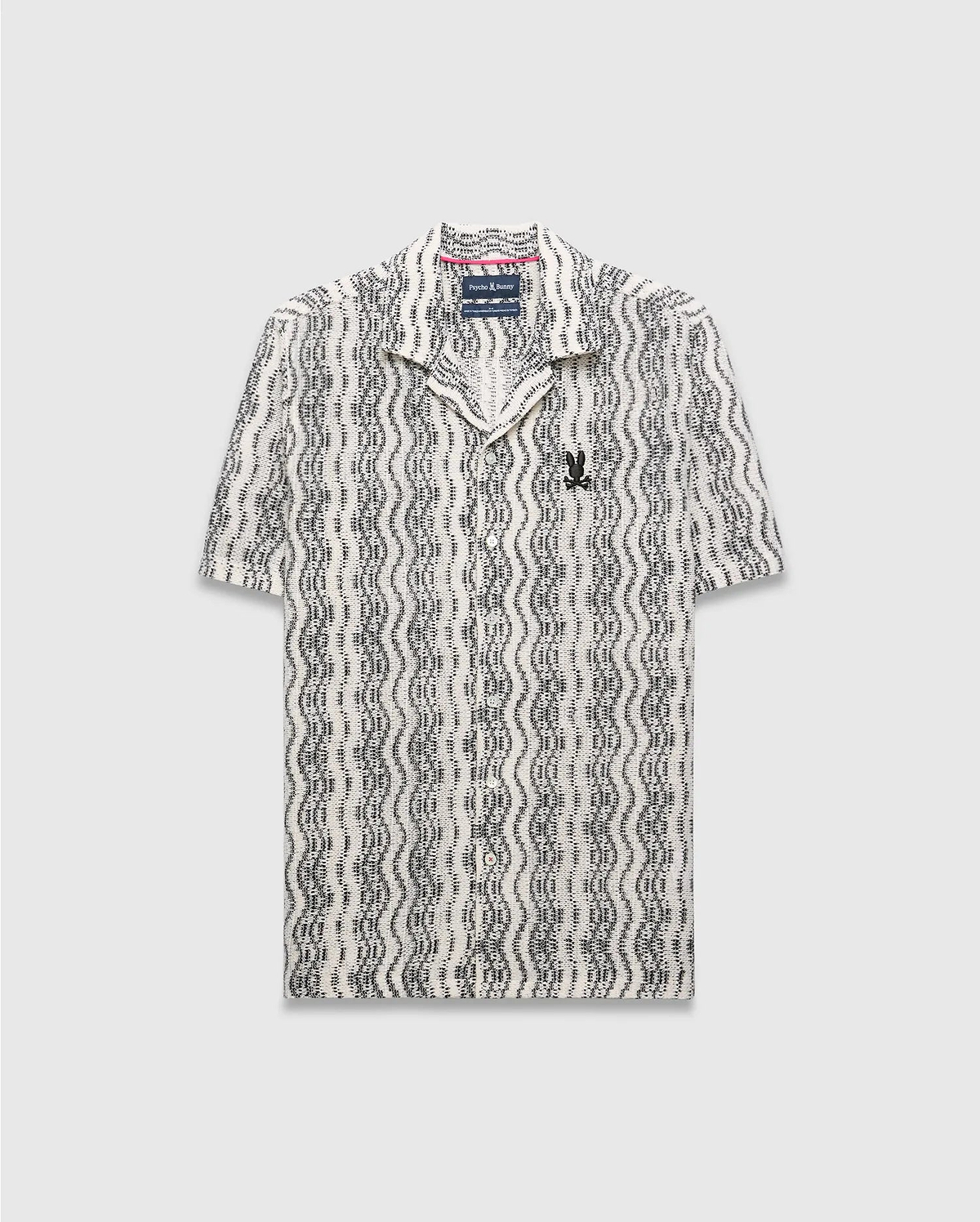 Mens Dave Crochet Shirt: Relaxed fit cream and black wavy stripe crochet knit shirt with a camp collar and small embroidered black Psycho Bunny skull logo on the left chest.