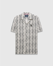 Mens Dave Crochet Shirt: Relaxed fit cream and black wavy stripe crochet knit shirt with a camp collar and small embroidered black Psycho Bunny skull logo on the left chest.