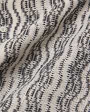 Mens Dave Crochet Shirt featuring an intricate open-weave knit in cream and black, forming a textured striped pattern, with a visible light button closure.