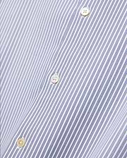 Mens Jim Stripe Jersey Knit L/s Shirt, a premium white long-sleeve shirt featuring fine blue vertical pinstripes and lustrous mother-of-pearl buttons, reflecting refined streetwear aesthetics.