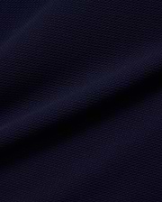 Mens Peter Knit Vest in a rich, dark navy blue, featuring a premium, finely textured knit fabric with a distinct, subtle pique-like weave, offering a sophisticated and breathable feel.