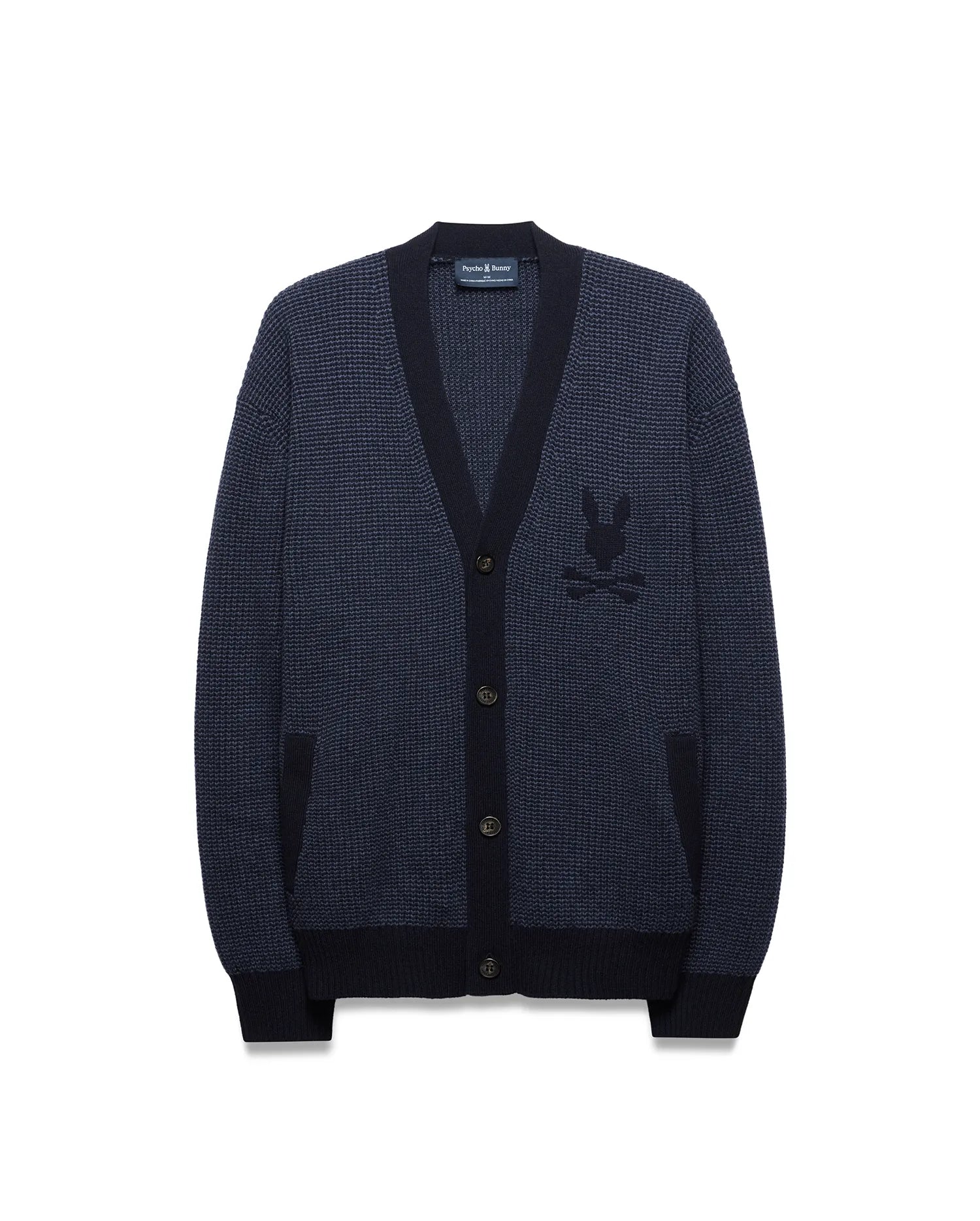 Mens Atkinson Cardigan, a navy blue waffle knit with dark navy ribbed V-neck, cuffs, and hem. Features a button-front, two patch pockets, and a prominent embroidered Psycho Bunny skull logo on the left chest. (5)
