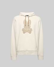 The Psycho Bunny MENS RYDER EMBROIDERED BUNNY PATCH HOODIE (MT0500029) is a cream-colored hoodie with a front pocket, drawstring hood, and large embroidered bunny skull and crossbones patch—ideal for cozy loungewear style.