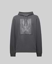 The Psycho Bunny MENS GRANT HOODIE - MT0500032 is a dark gray premium cotton hoodie featuring a front pouch pocket and a bold, digital-inspired bunny skull and crossbones outlined with white horizontal lines on the chest.