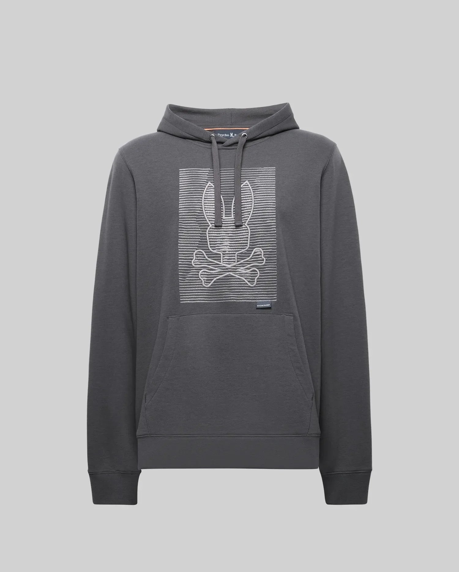 The Psycho Bunny MENS GRANT HOODIE - MT0500032 is a dark gray premium cotton hoodie featuring a front pouch pocket and a bold, digital-inspired bunny skull and crossbones outlined with white horizontal lines on the chest.