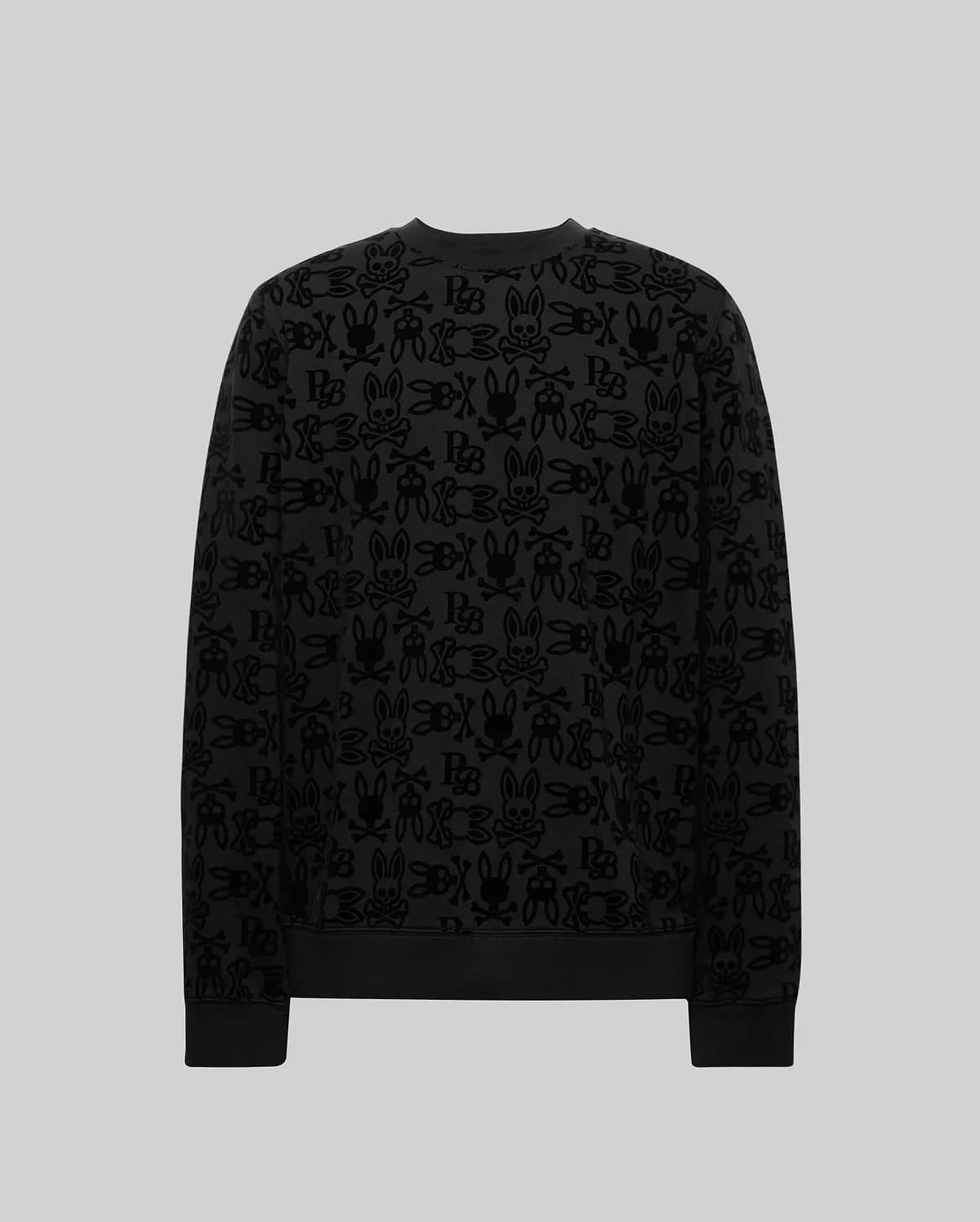 The Psycho Bunny MENS REED FLOCK CREW (MT0500041) is a premium cotton blend pullover with an all-over black cartoon bunny and letter print on gray, featuring a crewneck design and shown from the back.