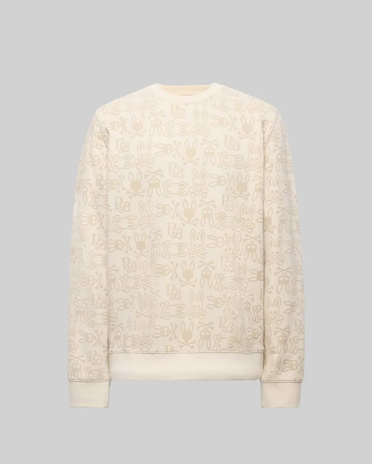 The Psycho Bunny MENS REED FLOCK CREW (MT0500041) is a premium cotton blend cream crewneck pullover, featuring a beige cartoon bunny pattern and "SBX" text on a plain gray background.