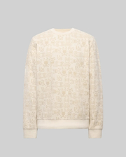 The Psycho Bunny MENS REED FLOCK CREW (MT0500041) is a premium cotton blend cream crewneck pullover, featuring a beige cartoon bunny pattern and "SBX" text on a plain gray background.