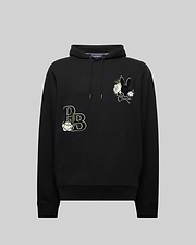 The Psycho Bunny MENS AUGUSTE HOODIE (MT0500043) is a black regular fit hoodie with a drawstring hood, chenille floral details, stylized "PB" letters, and a floral bunny design on the upper left chest, shown on a plain gray background.