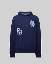 The Psycho Bunny MENS AUGUSTE HOODIE (MT0500043) is a navy blue, regular fit premium cotton hoodie with chenille floral patches: "PB" with a blue rose, and a white bunny with a blue rose. Features front pocket and drawstring hood.