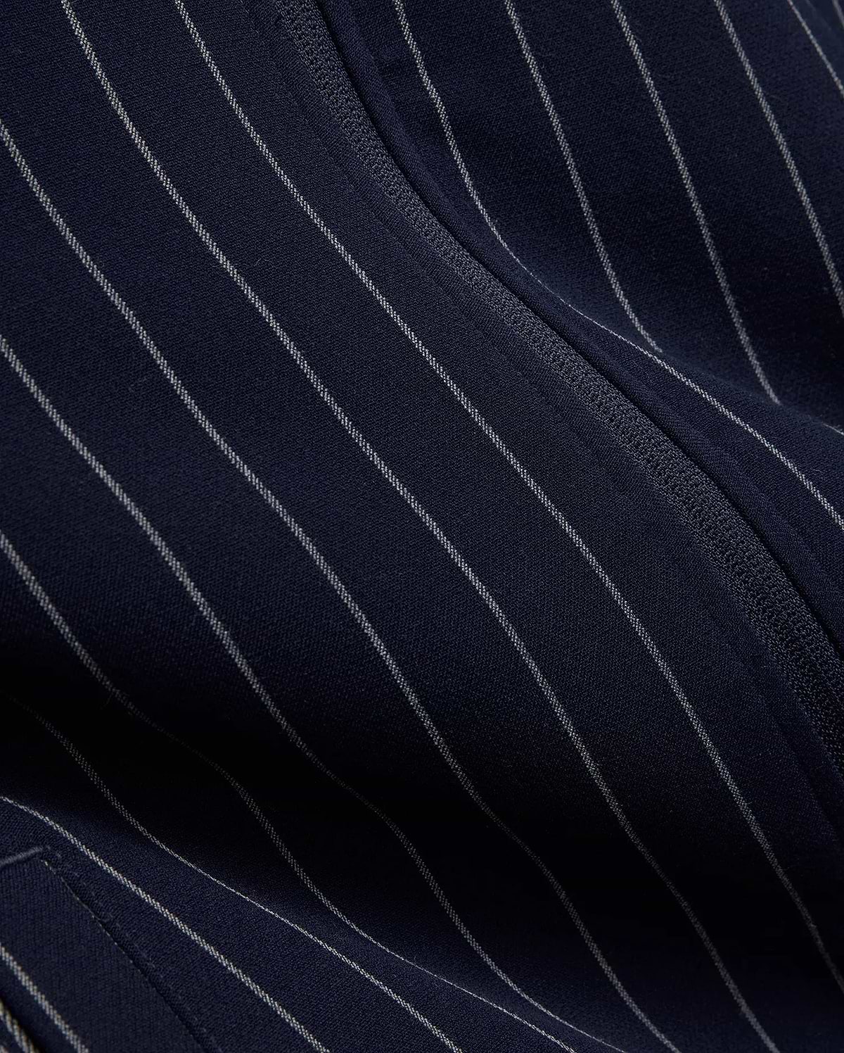 Mens Harland Double Weave Chalk Stripe Track Jacket in navy, featuring subtle white pinstripes and a textured zipper, highlighting its premium double weave fabric. (7)