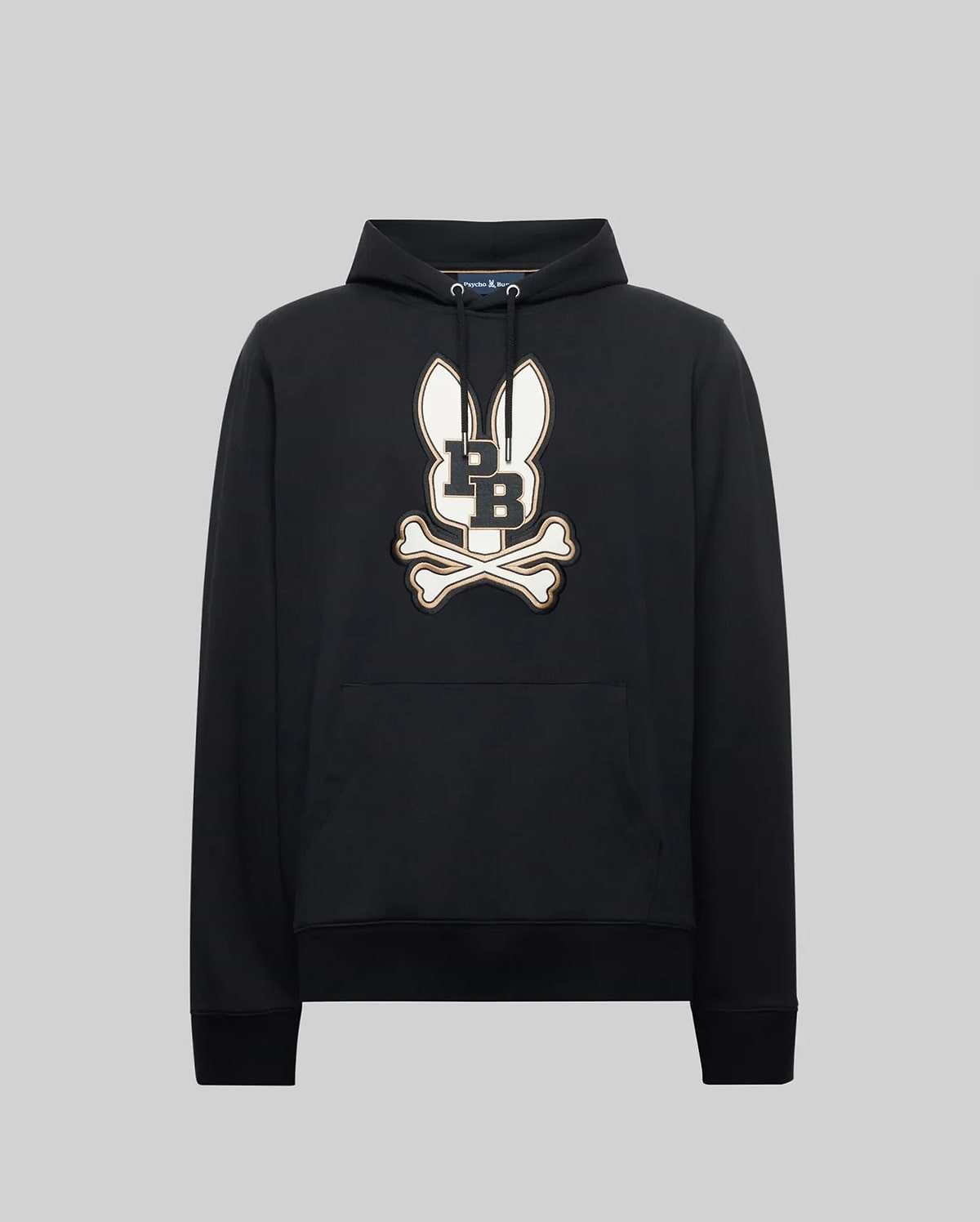 The Psycho Bunny MENS WADE CORD PATCH HOODIE - MT0500112 is a black premium cotton-blend hoodie featuring a bold bunny head with long ears above crossed bones and "L" and "B" on the chest, shown on a plain gray background.
