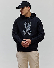Mens Olivier Embroidered Hoodie in black, featuring a classic fit and soft French terry fabric. A large, textured white and grey Psycho Bunny skull logo is prominently embroidered on the chest.