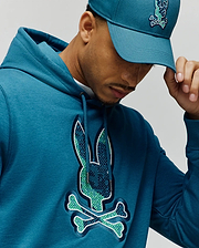 Mens Olivier Embroidered Hoodie in deep teal jersey, showcasing a large, intricately embroidered Psycho Bunny skull logo on the chest in green, teal, and white, with a classic fit and drawstring hood. (2)