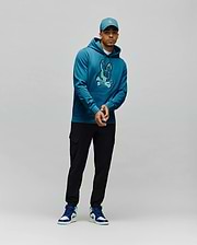 Mens Olivier Embroidered Hoodie, a classic fit deep teal french terry hoodie with a large, vibrant light teal embroidered Psycho Bunny skull logo on the center chest. (4)