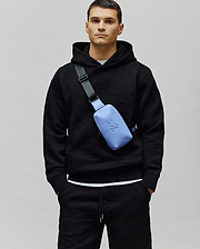 Mens Dustin Hoodie, black premium textured knit with an all-over embossed Psycho Bunny skull logo pattern, featuring a classic fit, drawstring hood, and ribbed cuffs. (1)