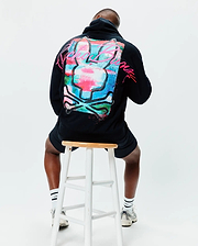 Mens Isaac Print Hoodie, black, relaxed fit, with a large vibrant paint-splatter bunny skull graphic on the back in pink, blue, green, and white, featuring neon pink Psycho Bunny text.