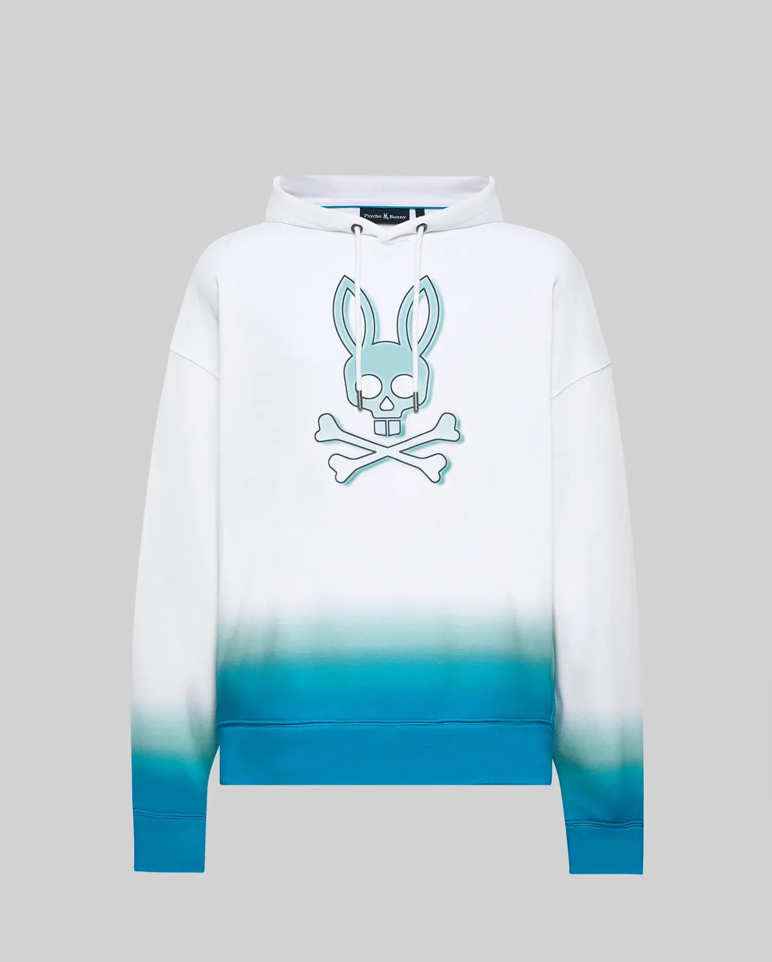 Mens Dax Oversized Hoodie, white smooth jersey hoodie with a large central teal Psycho Bunny skull and crossbones logo, featuring a vibrant blue ombre fade at the hem. (5)