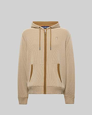 Mens Maxton Waffle Full Zip Hoodie in tan with a fine grid pattern, featuring brown zipper, drawstrings, and pocket trim. A small embroidered Psycho Bunny skull logo adorns the left chest.