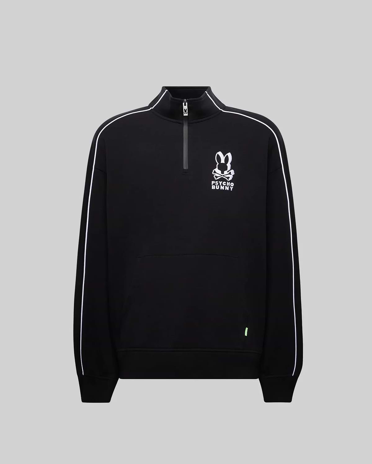 Mens Toby 1/4 Zip, a black relaxed-fit smooth knit pullover with a stand collar, white piping on sleeves, a kangaroo pocket, and a prominent white embroidered Psycho Bunny skull and crossbones logo on the chest, accented by a neon green tag.