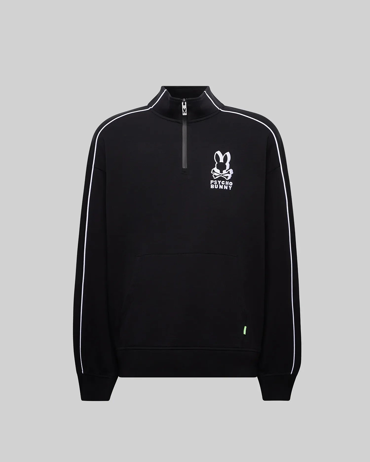 Mens Toby 1/4 Zip, a black relaxed-fit smooth knit pullover with a stand collar, white piping on sleeves, a kangaroo pocket, and a prominent white embroidered Psycho Bunny skull and crossbones logo on the chest, accented by a neon green tag.