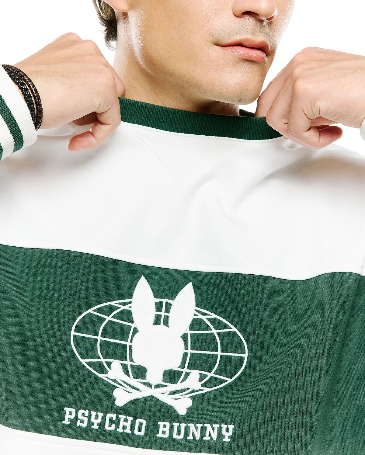 Mens Mike French Terry Crew, a color-block sweatshirt in white and dark green. Features a ribbed green collar, striped cuffs, and a large embroidered white Psycho Bunny skull globe logo with text on the chest.