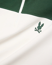 Mens Gabe French Terry 1/4 Zip, a white and dark green color-block design with a small, embroidered dark green Psycho Bunny skull logo on the chest. Soft French terry fabric.