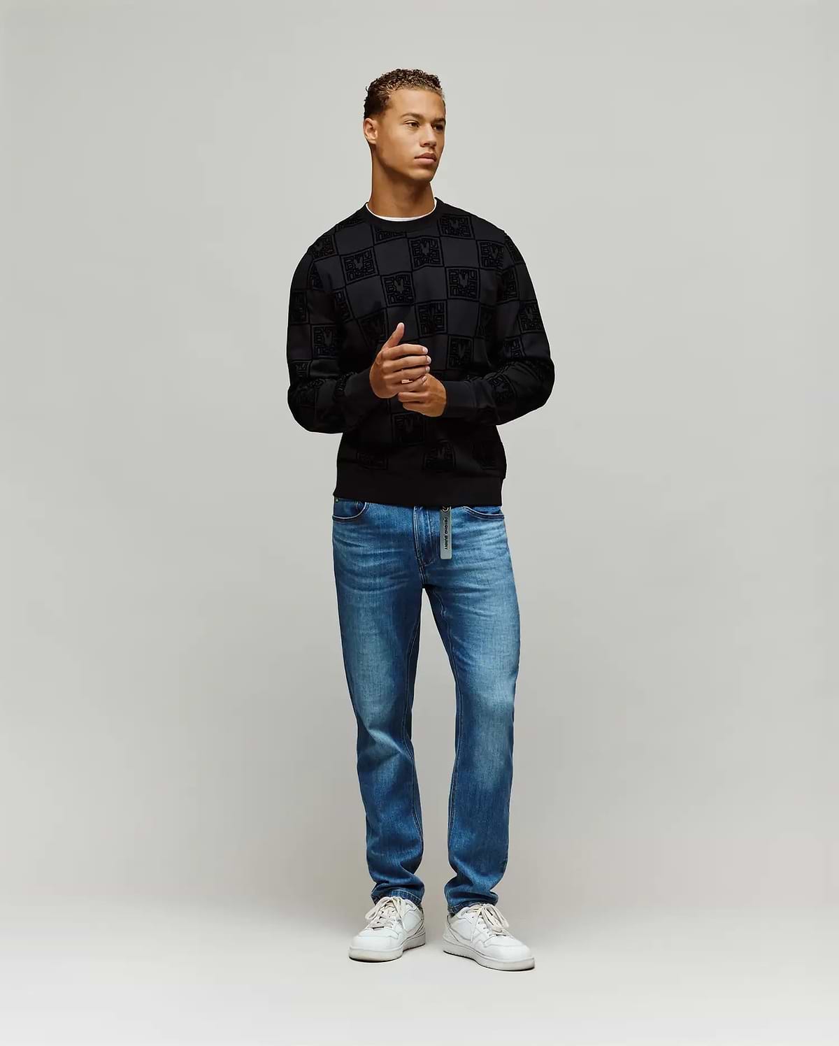 Black Mens Gio All Over Flock Crew sweatshirt with a classic fit, featuring an all-over flocked checkerboard pattern incorporating the iconic Psycho Bunny skull logo.