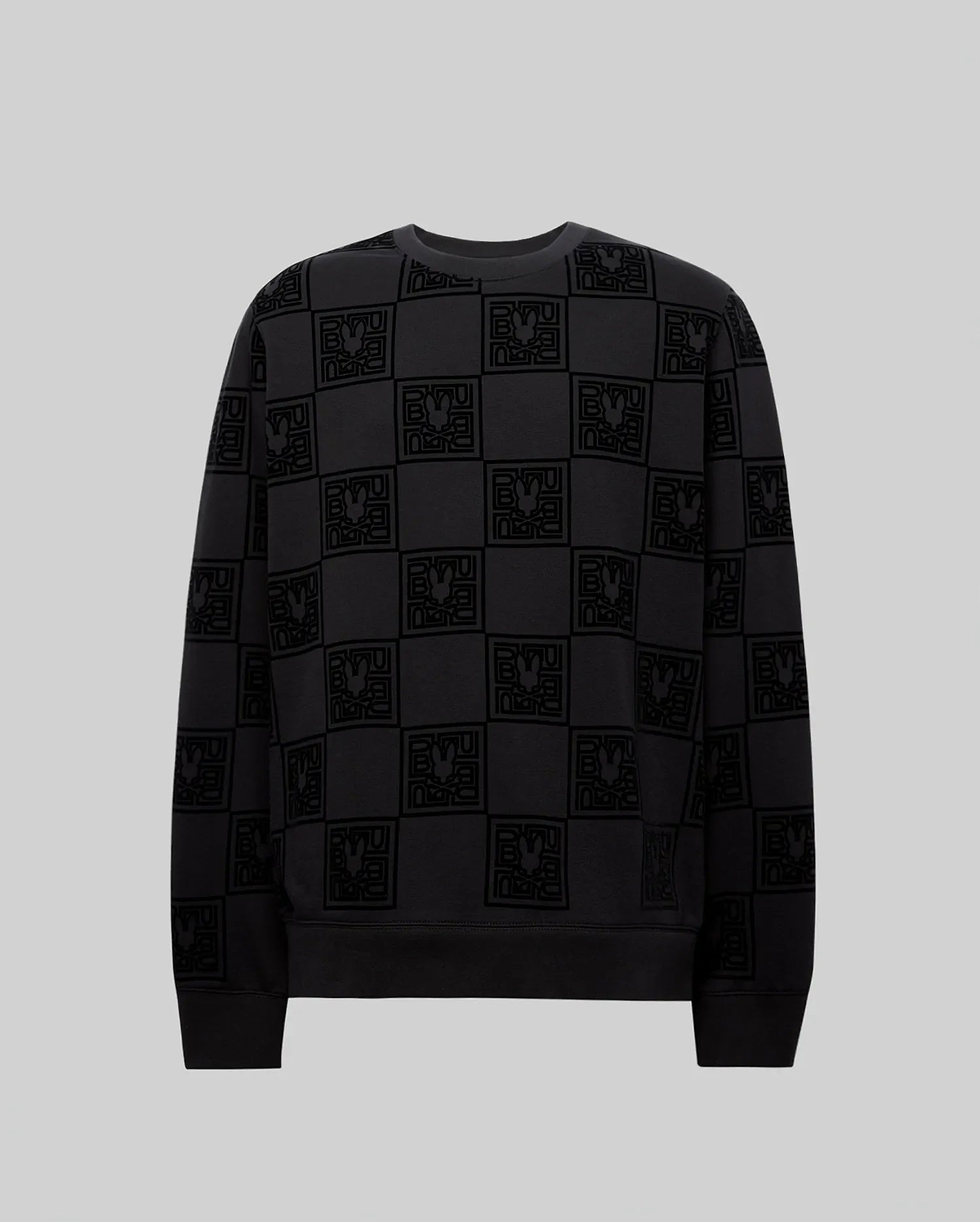 Mens Gio All Over Flock Crew, a black relaxed-fit jersey crewneck sweatshirt featuring an all-over tonal flocked checkerboard pattern of the iconic Psycho Bunny skull logo and stylized text.
