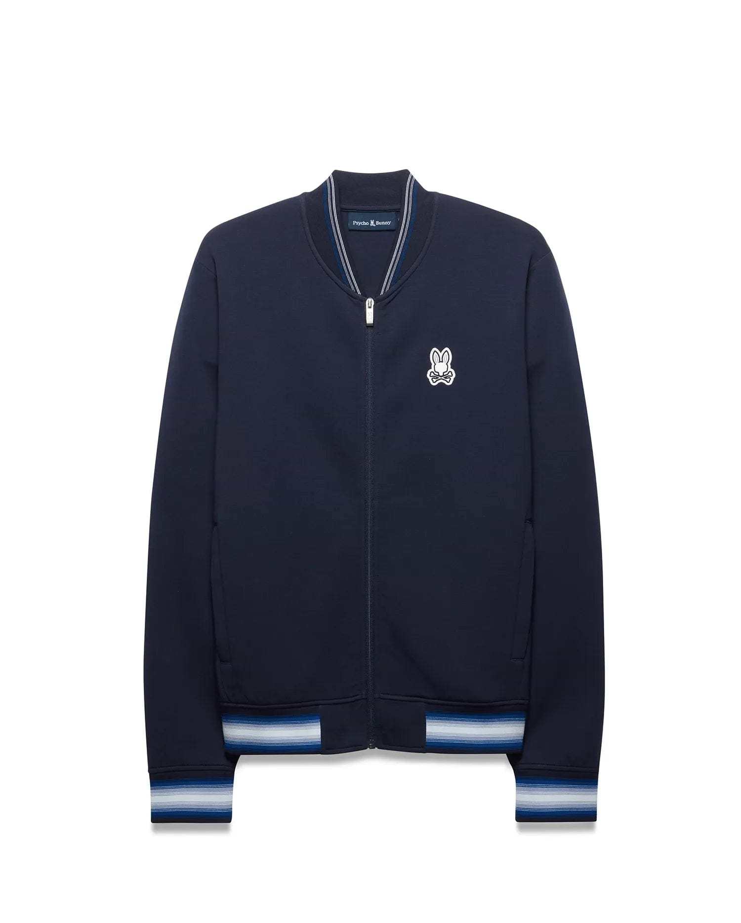 Mens Jaydon Track Jacket in navy, featuring a classic fit, smooth jersey fabric, embroidered white Psycho Bunny skull logo on the left chest, and striped ribbed collar, cuffs, and hem in white and blue. (5)