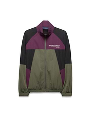 Mens Alder Nylon Colorblock Jacket, a relaxed fit full-zip crinkled nylon jacket in black, purple, and olive green colorblock, with a white Psycho Bunny Designed For Disruption text logo on the left chest.
