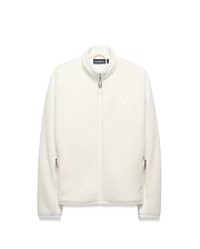 Men's Rowley Sherpa Zip Jacket, a cream-colored full-zip jacket with a soft sherpa texture, features a large embroidered Psycho Bunny skull logo on the left chest and orange/navy accent zipper pulls. (5)