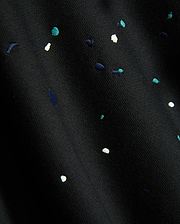 Mens Malcom Splatter Hoodie in black, featuring a soft knit fabric with an embroidered multi-color splatter pattern in white, teal, and dark blue.