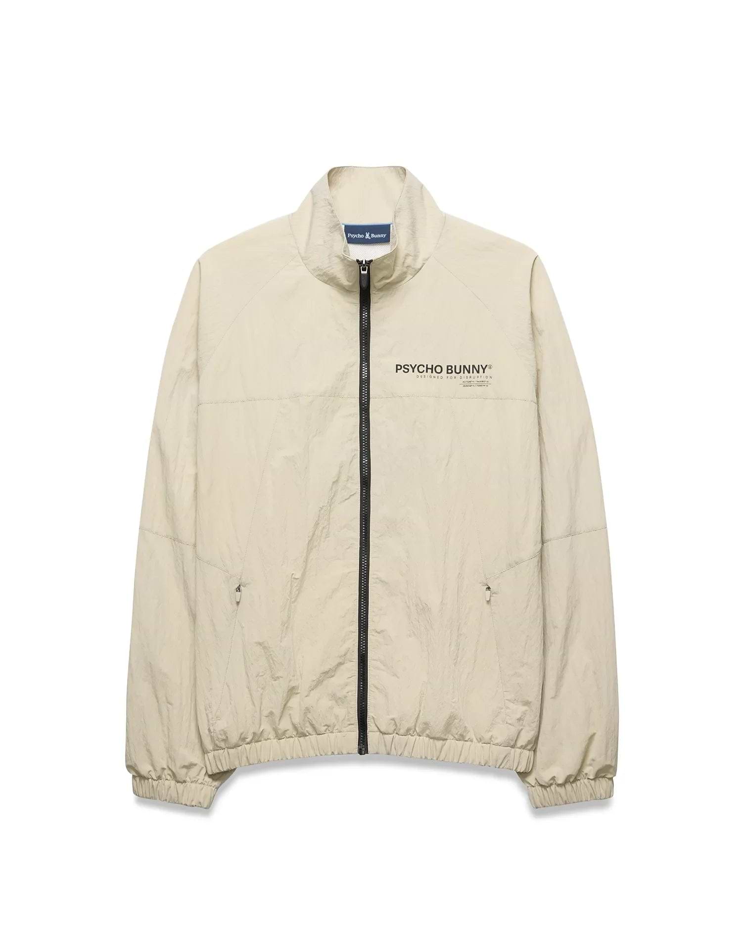 Light beige Mens Alder Nylon Jacket, a classic fit crinkled nylon jacket with full black zip, stand collar, zippered side pockets, elastic cuffs/hem, and a black Psycho Bunny chest logo. (6)