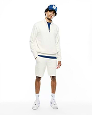 Mens Marc Textured 1/4 Zip in cream, a classic fit textured knit pullover with a small embroidered Psycho Bunny skull logo on the chest, accented by royal blue underlayer and matching shorts. (2)