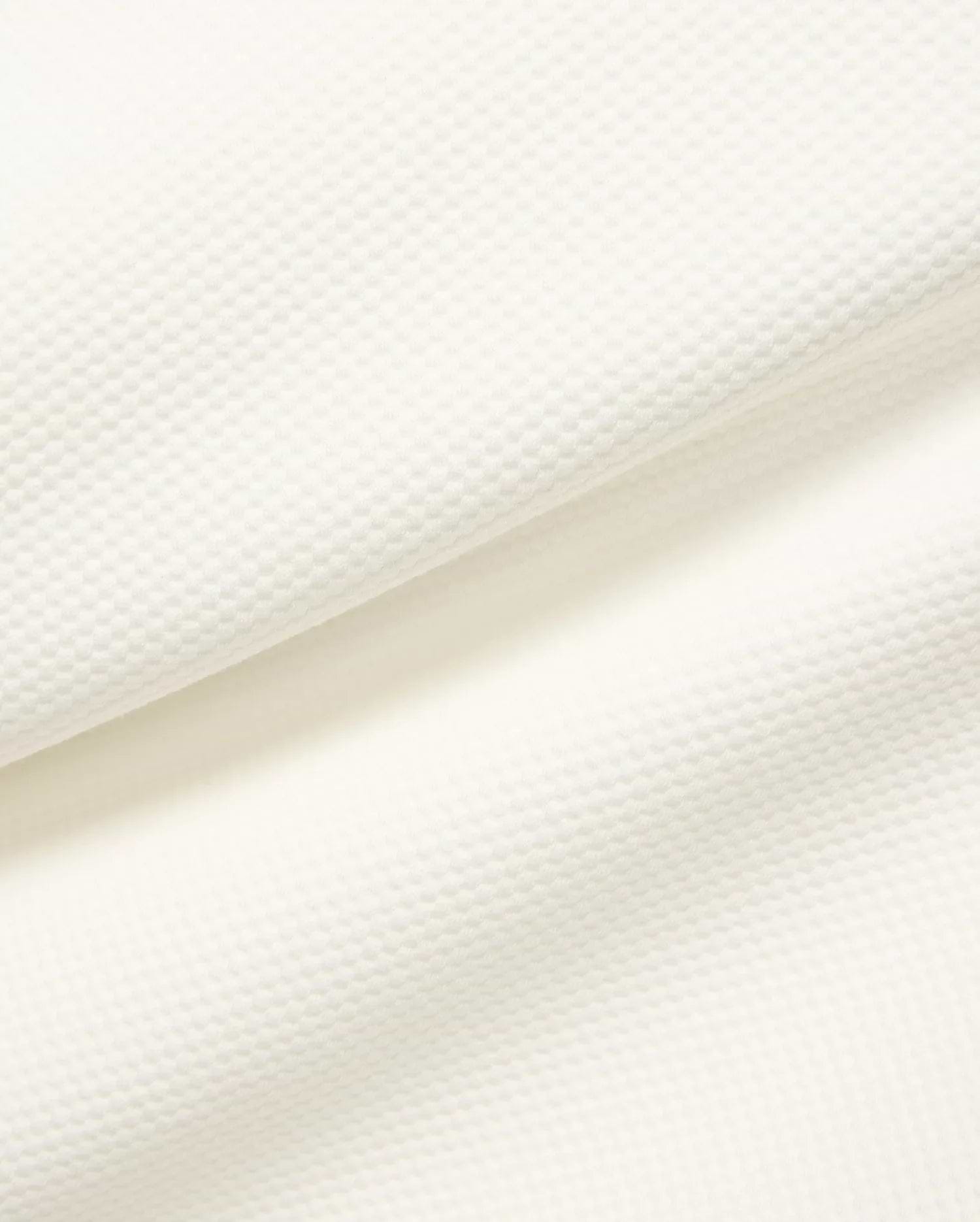 Mens Marc Textured 1/4 Zip in cream, showcasing a premium, subtly textured pique knit fabric with a fine, raised geometric pattern. (7)