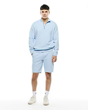 Light blue Mens Marc Textured 1/4 Zip and matching textured shorts, featuring a relaxed fit, silver quarter-zip, and small embroidered Psycho Bunny skull logo on the left chest.