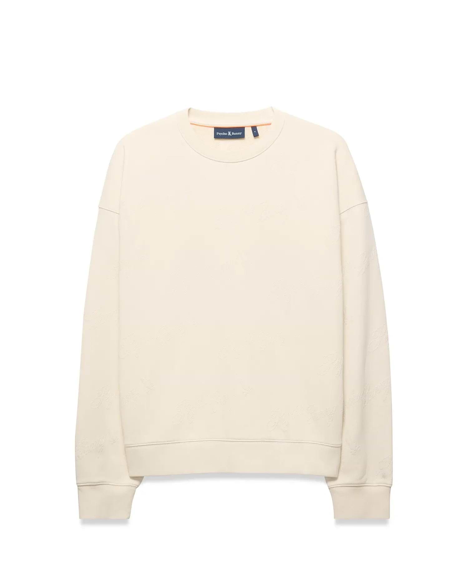 Mens Cedrick All Over Jacquard Crew. Cream relaxed fit crewneck sweatshirt featuring a subtle all-over tonal Psycho Bunny logo jacquard pattern and small embroidered bunny skull logo on left chest.