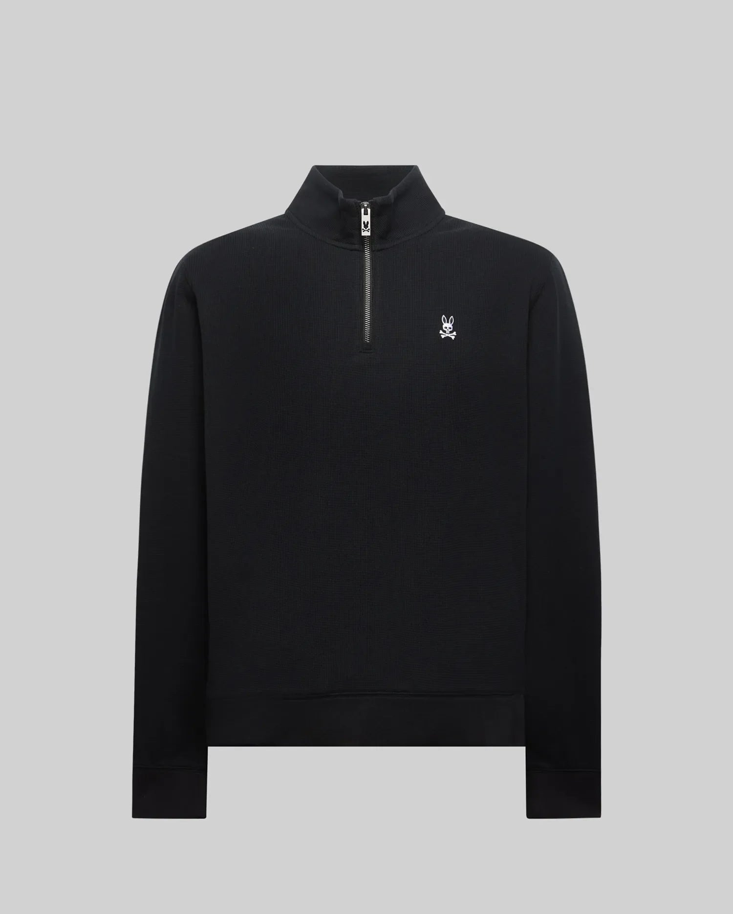 MENS MAXTON WAFFLE 1/4 ZIP, a classic fit black waffle knit pullover featuring a stand-up collar, quarter-zip closure, and a small white embroidered Psycho Bunny skull logo on the left chest.