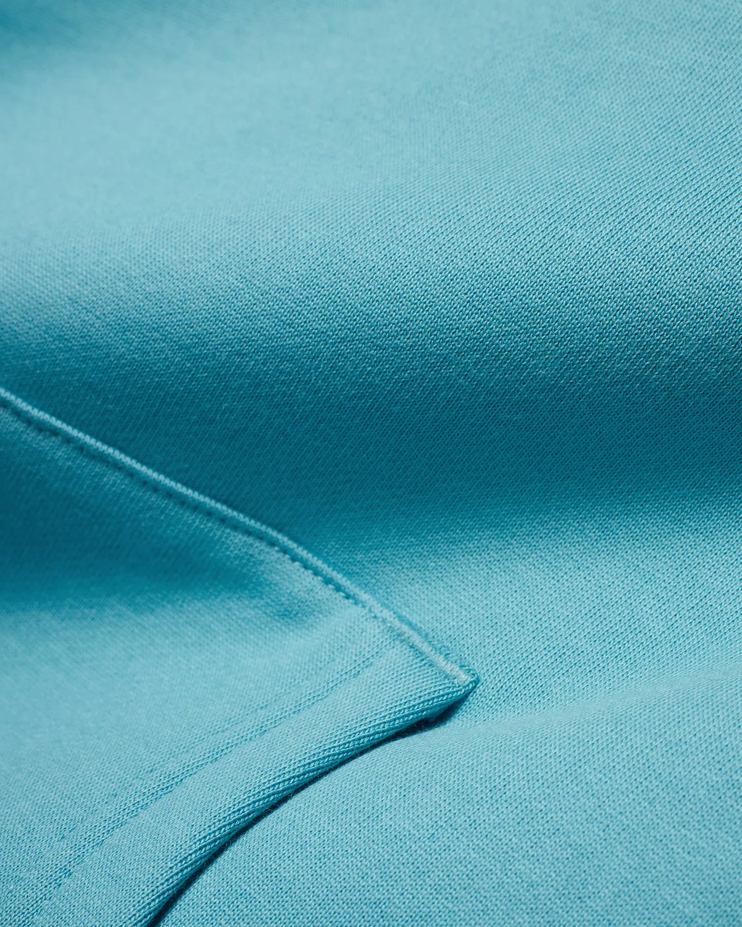 Men's Terrence Fleece Hoodie in vibrant aqua teal, featuring a luxurious soft fleece texture and precise seam stitching, embodying premium streetwear style. (6)